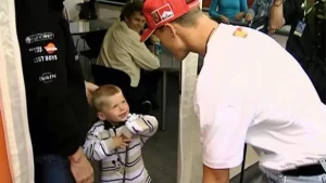 Michael Schumacher con un pequeño Max Verstappen.