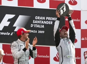 Rubens Barrichello junto a Jenson Button en el podio del Gran Premio de Italia 2009.